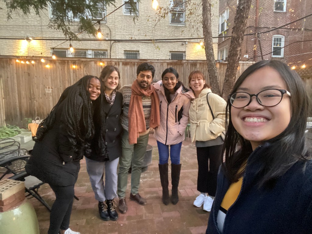Sam with her friends at a Friendsgiving Dinner