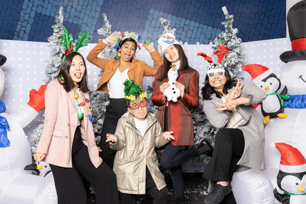 Cherry and her friends at a Christmas photo shoot in the Penn bookstore